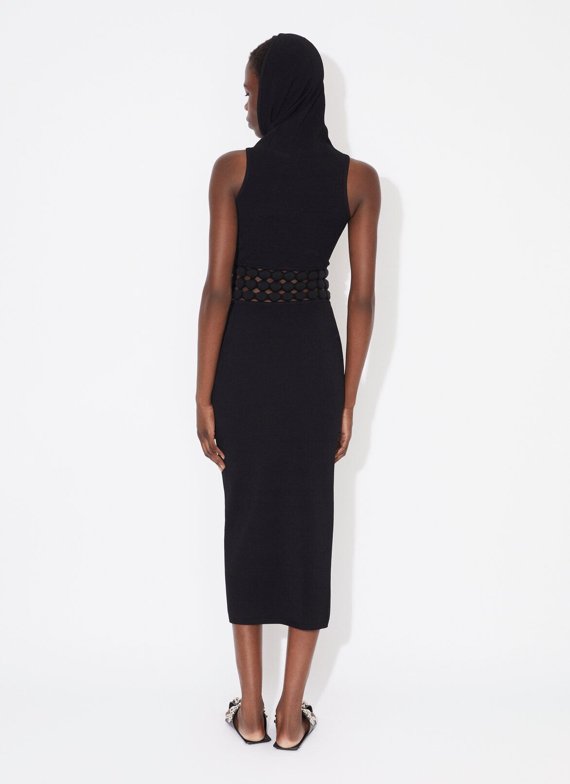 KLEID MIT KAPUZE MIT 3D-PERFORATIONEN ALAÏA SCHWARZ KLEID MIT KAPUZE MIT 3D-PERFORATIONEN